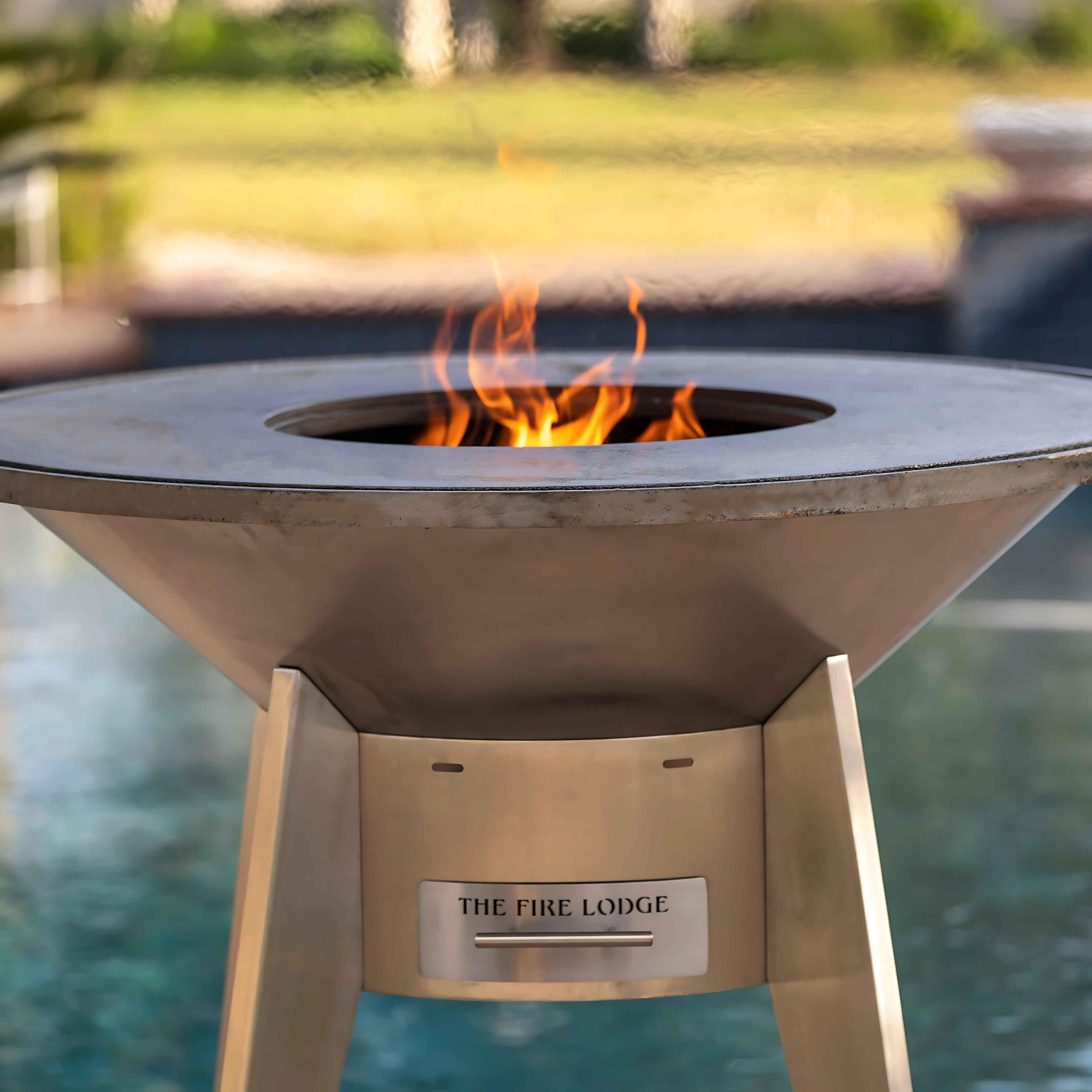 The Outdoor Plus Mojave Wood Burning Cast-iron Grill Metal Collection
